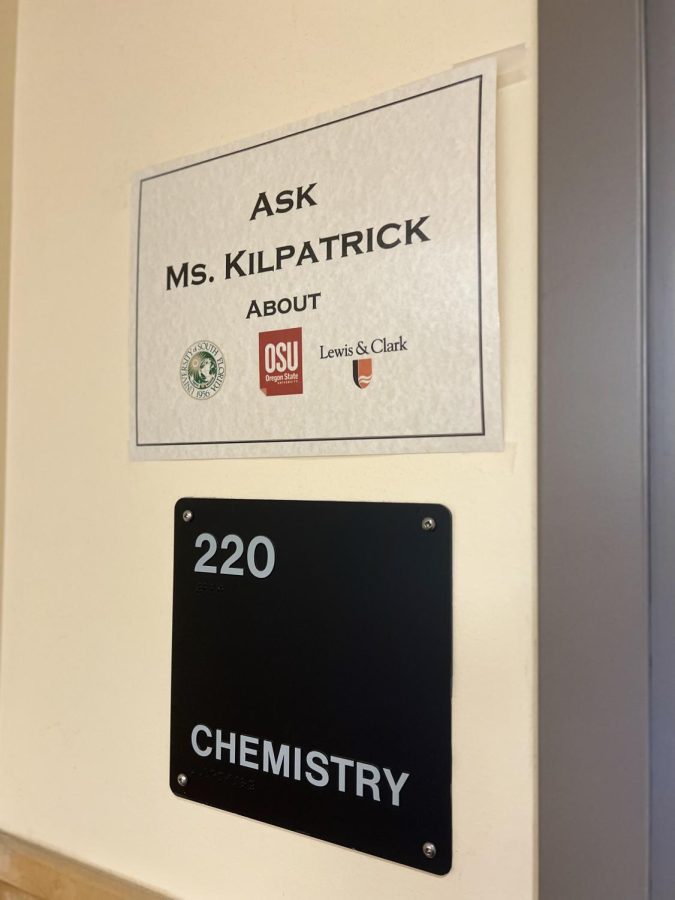 The+sign+outside+of+Chemisty+teacher+Ms.+Kilpatricks+room+sports+the+Oregon+State+University+emblem.+Ms.+Kilpatrick+often+implores+her+students+to+explore+honors+college+opportunities%2C+even+close+to+home.+