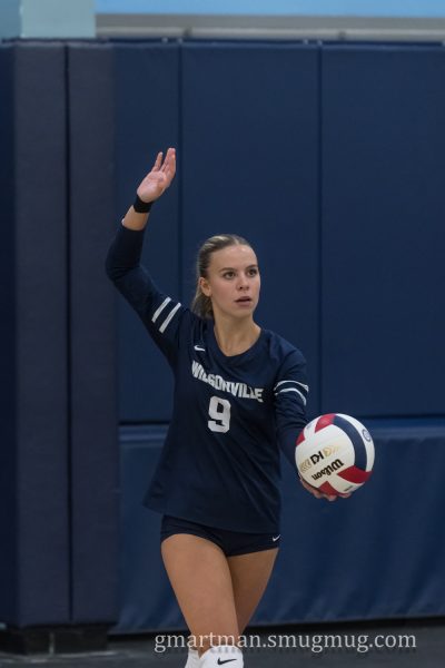 Cammy Gore serves in a Wilsonville win earlier in the year. Gore has been a key setter for a Wilsonville squad, which looks to have a strong finish to their regular season. Photo provided by Greg Artman.