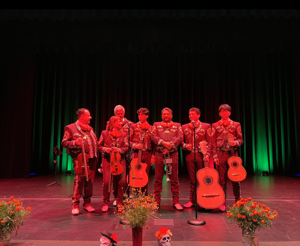 The mariachi band stands at center stage. They had an excellent performance for the Dia de los Muertos celebration at Wilsonville High!