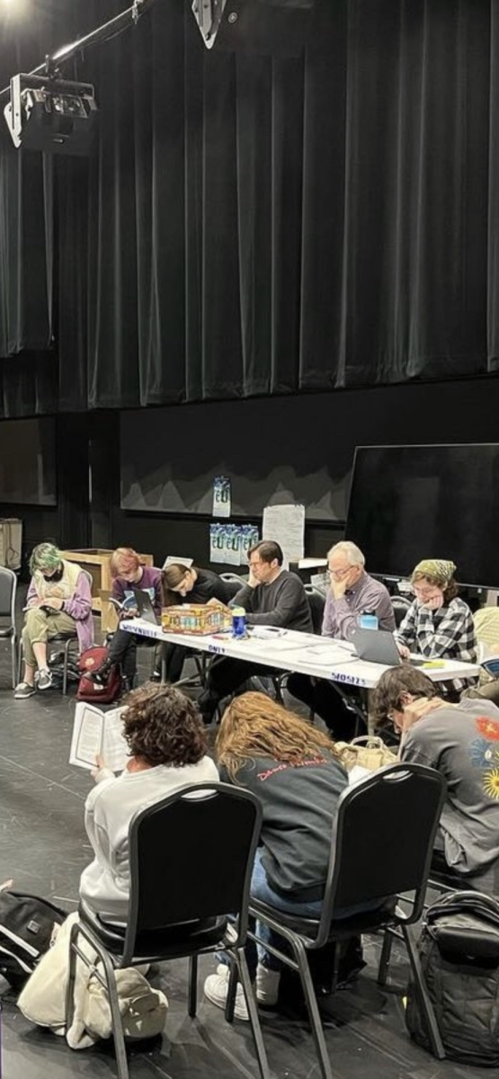 The cast of The Tempest sit down for their first table read. The later began to rehearse for the first time this year. 