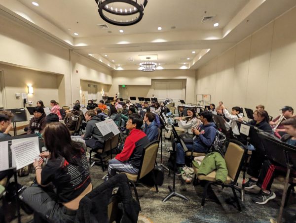 OMEA All-State students rehearse in their hotel ballroom. The ice storm presented many challenges, but the group pushed through and had an impactful experience