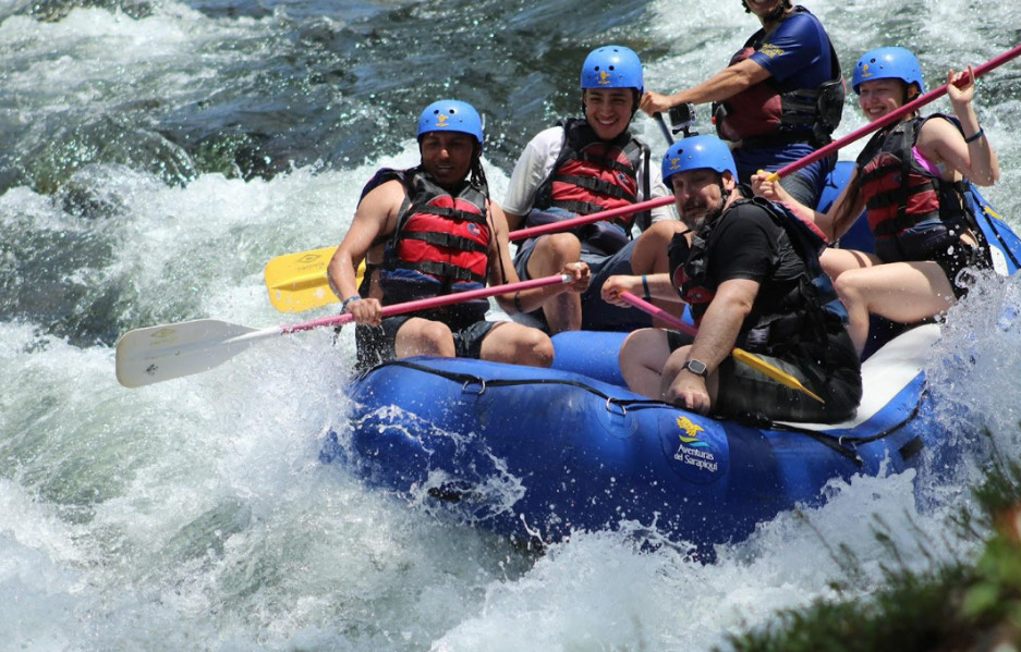 Profe Canales and some students rafting at the last Costa Rica trip. This trip provides opportunities for students to experience other cultures. Photo provided by Cristian Canales.