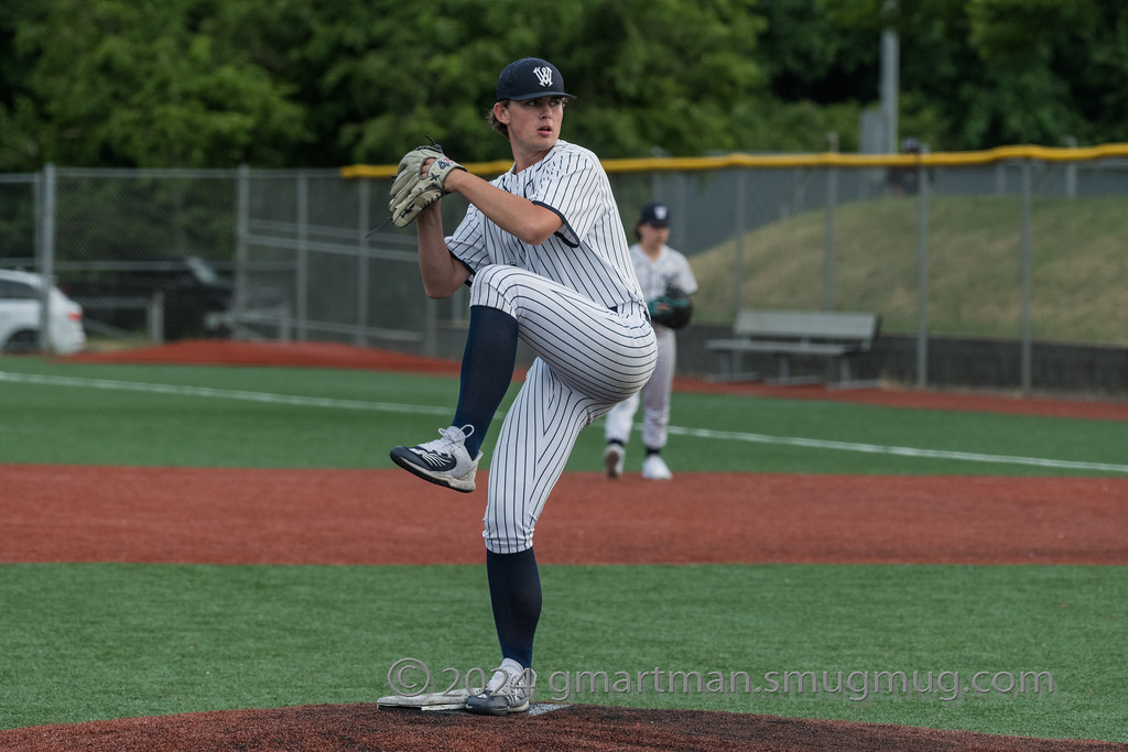 Luke Haener winds up and fires towards home plate in a 12-1 win over North Eugene in the first round of the 2023 playoffs. Haener looks to be a huge part of a great Wilsonville rotation this year. Photo provided by Greg Artman.