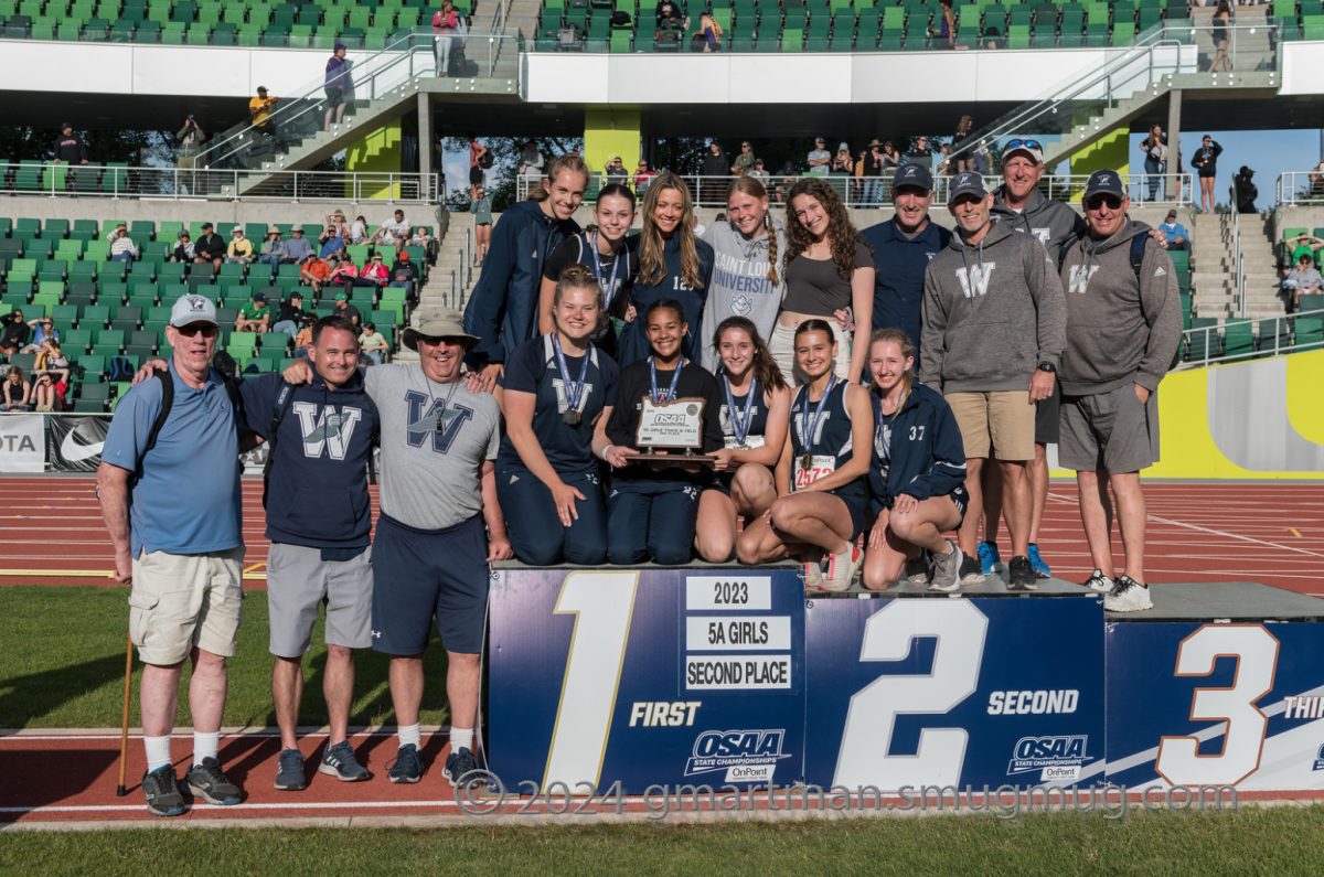Wilsonville+girls+pose+for+a+photo+with+the+2nd+place+trophy+at+last+year%E2%80%99s+state+meet.+Wilsonville+is+shooting+for+that+gold+first+place+trophy+at+this+year%E2%80%99s+meet.+Photo+provided+by+Greg+Artman.