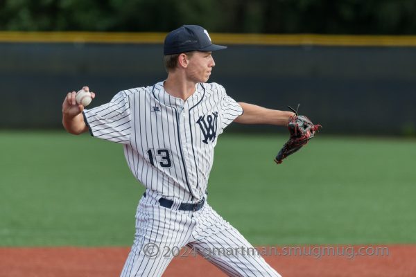 Justin Schramm makes a play at third base earlier this season. Schramm dealt in the first game of the series vs La Salle giving Wilsonville the 1-0 victory. Photo provided by Greg Artman. 