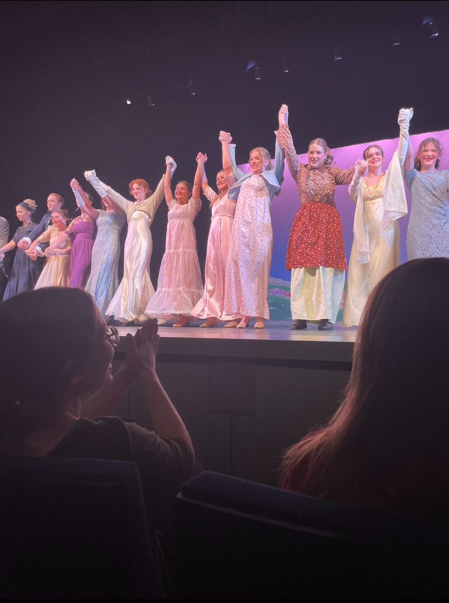 The cast of Sense and Sensibility bows for the audience after their performance. Later, they met with their friends and family in the lobby of the Performing Arts Center.  
