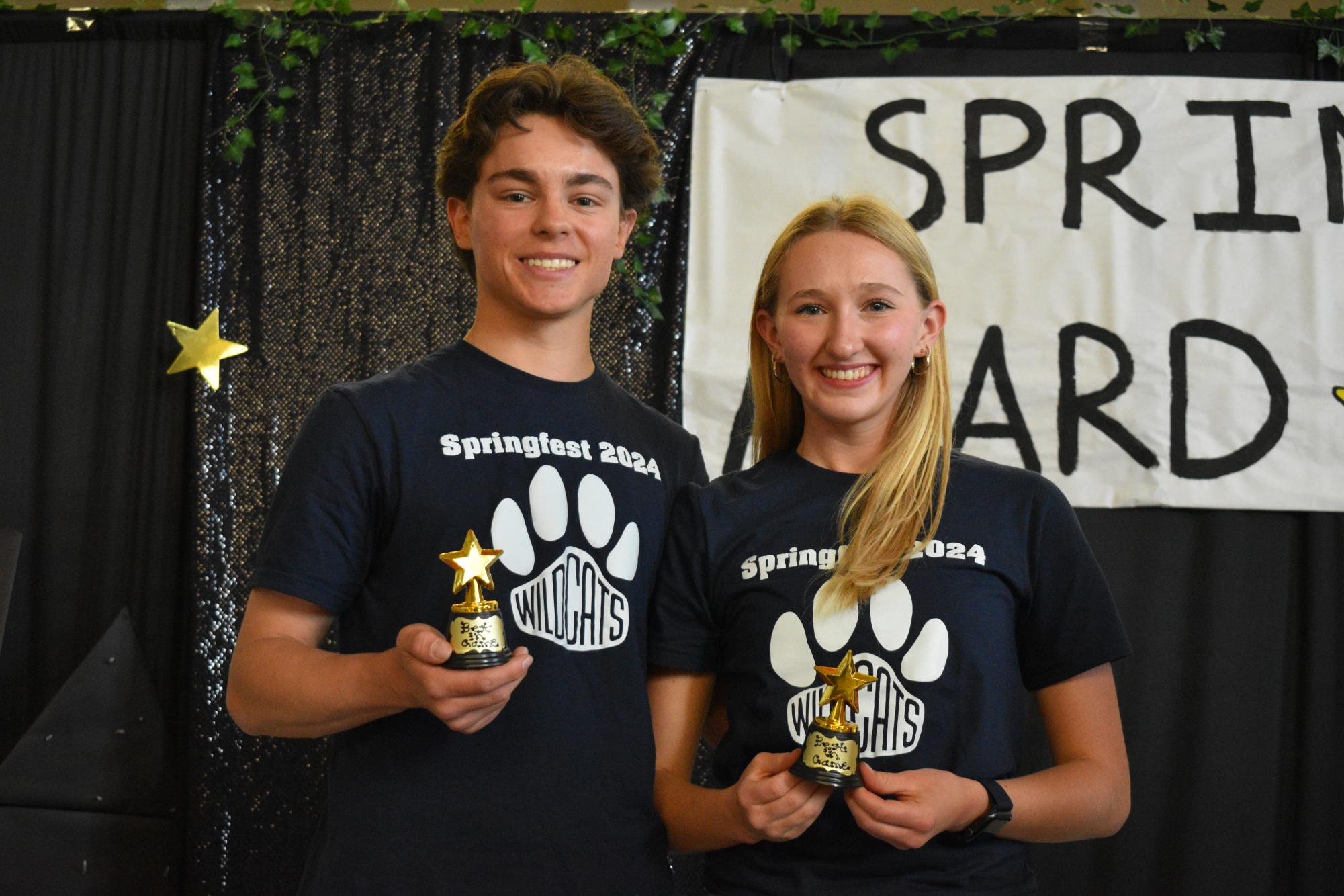 Berkeley Reents and Ella Milanovich pose with their Best in Game Awards. They were both very happy to participate in such a great event. 