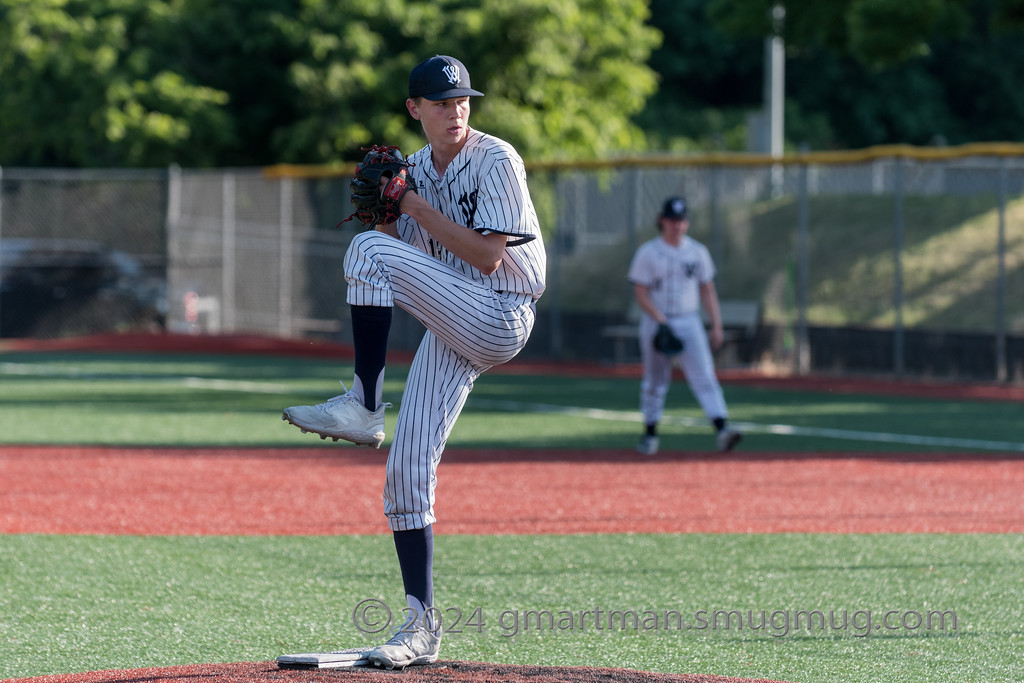 Justin+Schramm+pitches+in+a+game+earlier+this+year+against+Rex+Putnam.+Schramm+combined+with+Elijah+Rasco+to+no+hit+Hillsboro+in+a+3-0+win+on+Wednesday.+Photo+provided+by+Greg+Artman.