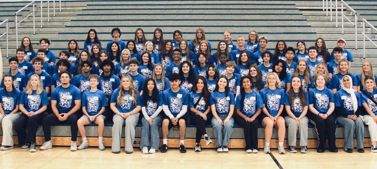 Representing their student body, students gather to form Link Crew, (an organized group of student leaders who welcome and support incoming freshmen throughout the school year). 