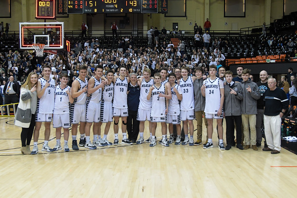 The Wilsonville boys basketball team celebrates their first place win over Churchill at Gill Coliseum.  The next generation of the boys basketball program  are now ready to step up and take over as the new leaders.