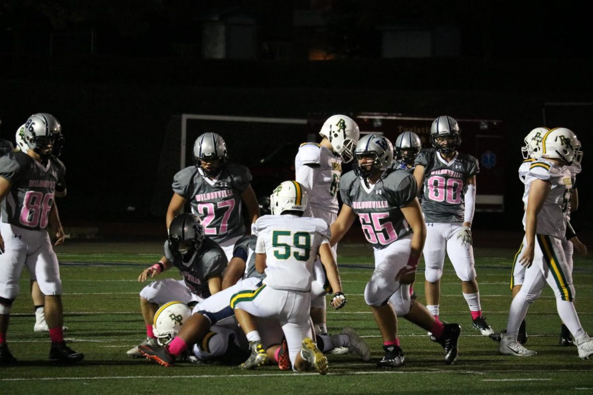 The Cats square off against Putnam during the pink-out game.