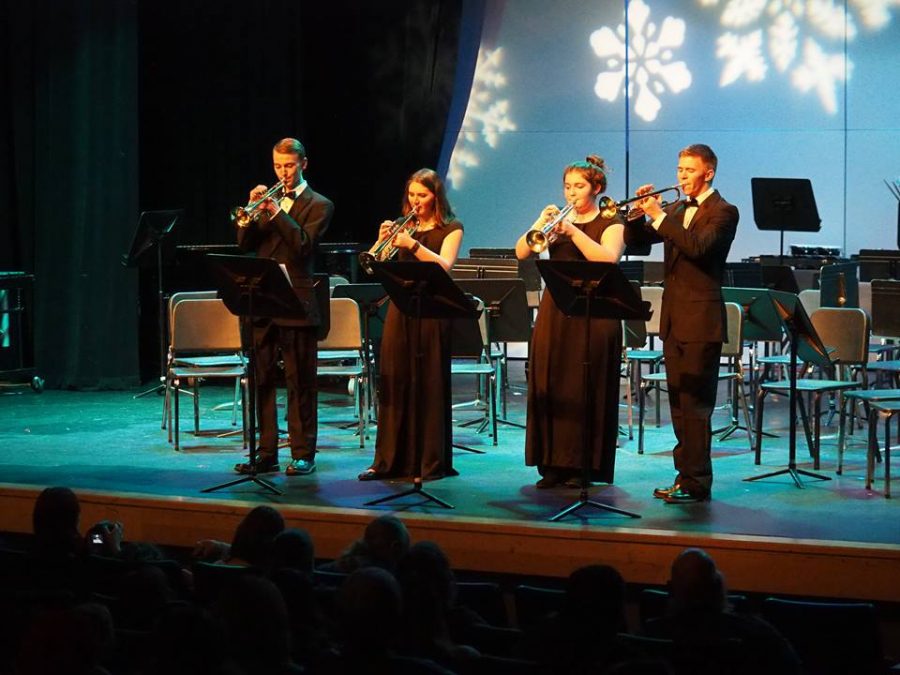 Junior Maddie Diehl, second from left, guest wrote this article.  Thanks, Maddie!  Photo by Roger Nuffer.