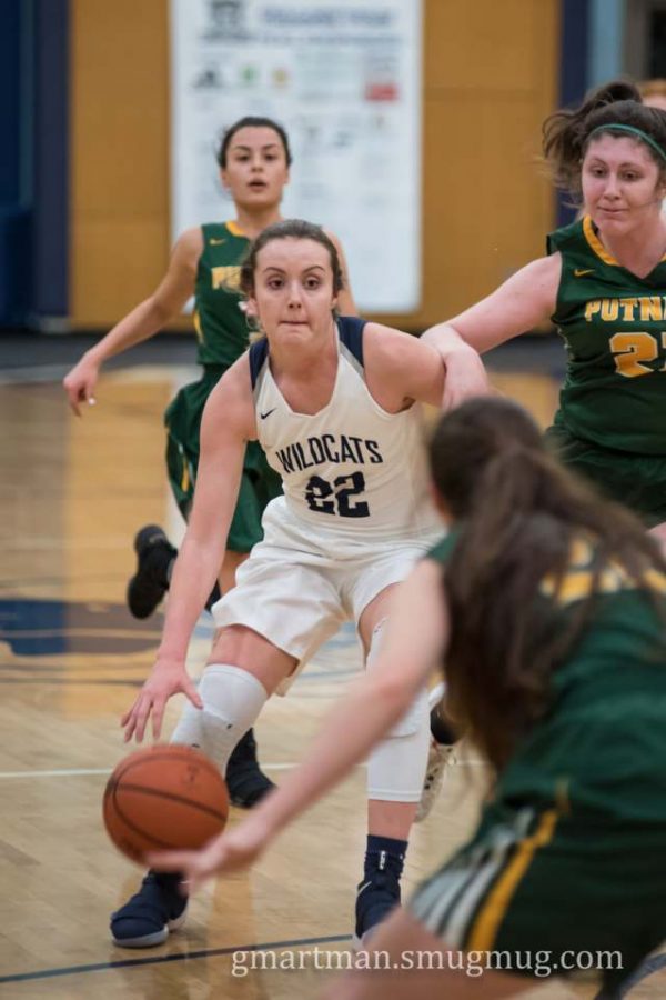 Cydney Gutridge charges down the court