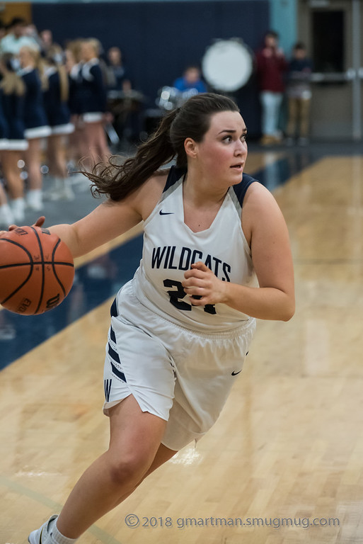 Senior Jessica Classen drives toward the basket.