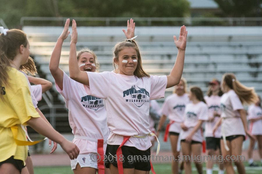 Brooklyn Waddell and Julia Huchler celebrate putting another point on the board. Hutchler kicked in a textbook field goal. 