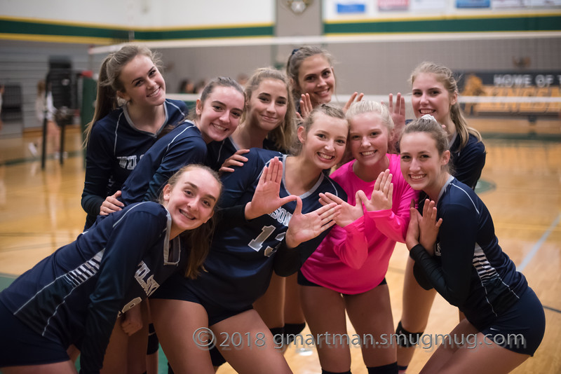 Volleyball team poses at their recent game against Putnam. 