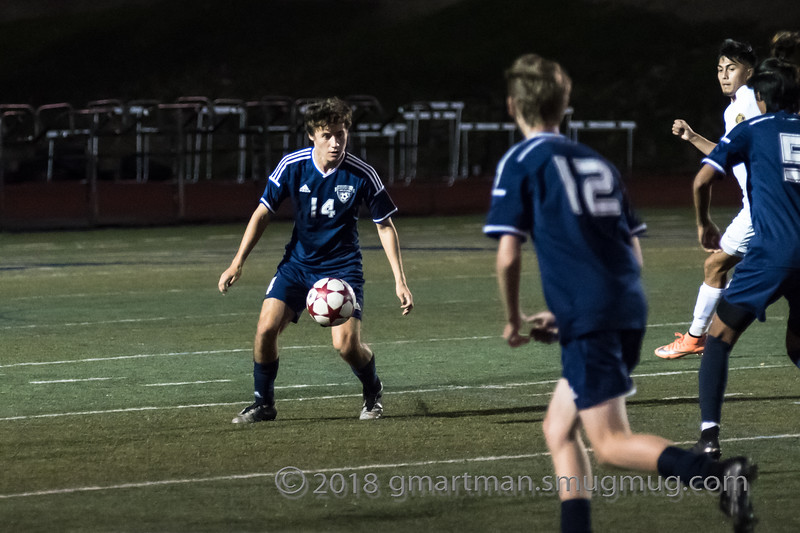 Sam Blohn controls the ball in a home game against Forest Grove