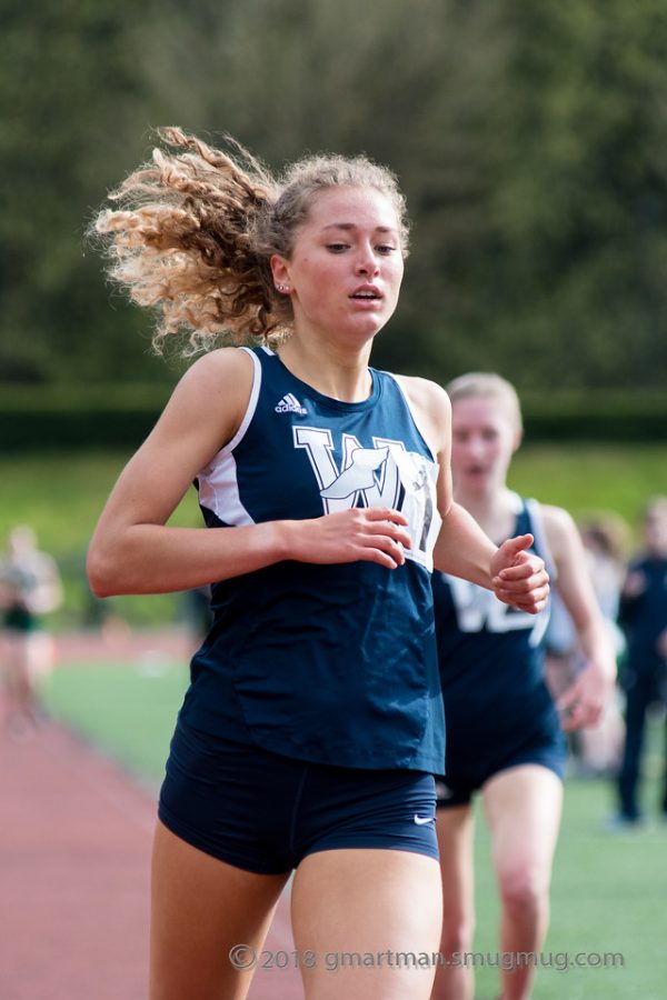 Samantha Prusse competes against Putnam in a home track meet. 