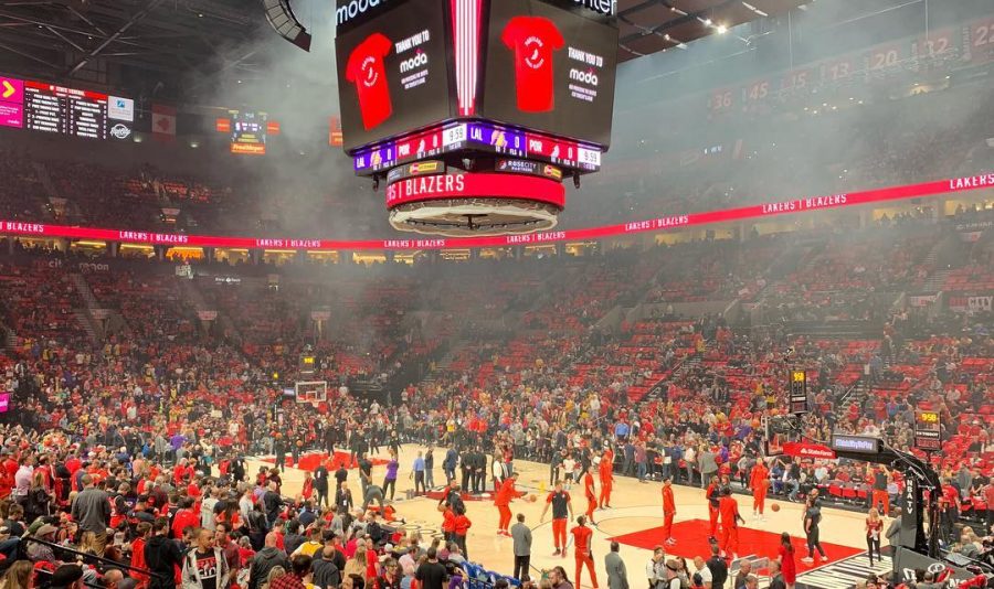 The Trail Blazers warm up at the Moda Center before the game begins