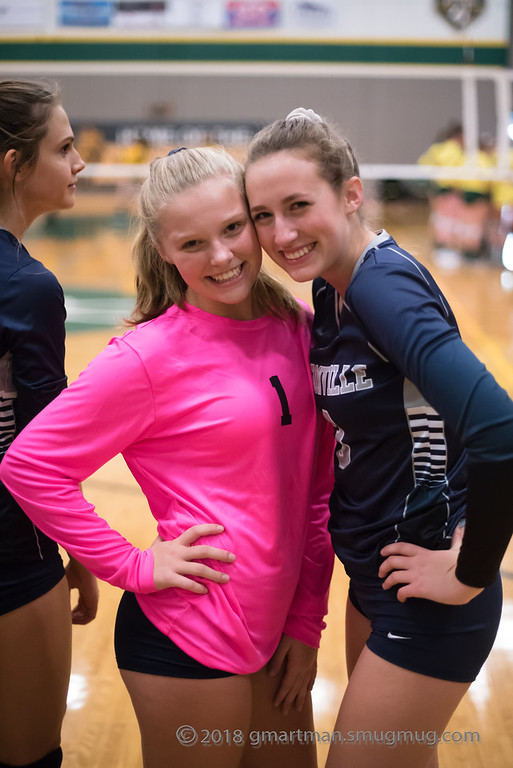 Juniors Grace Thompson and Kennedy Juranek before a match. The Wildcats are undefeated in league this year, and hoping to win the state playoffs.