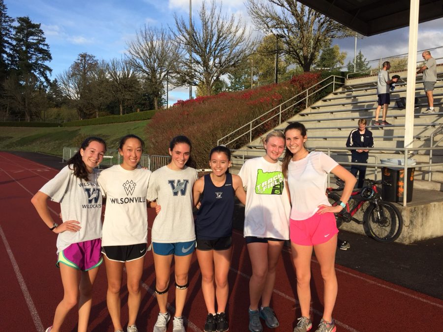 Several junior varsity athletes pose happily after the race. They received their cookies the next day!