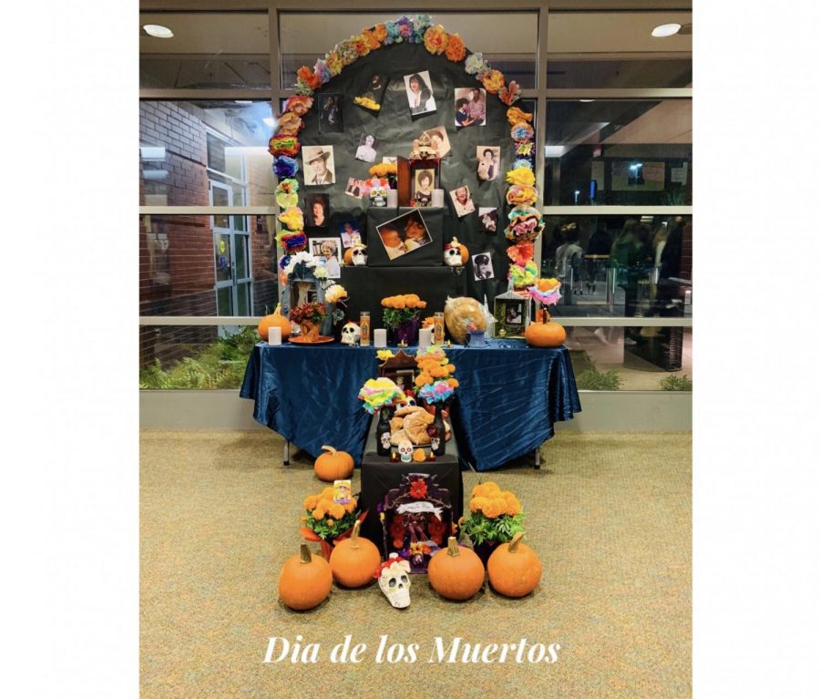 Ofreda featured at the Dia de los Muertos celebration. Guests were welcomed to added pictures to the ofrenda if they wanted to.