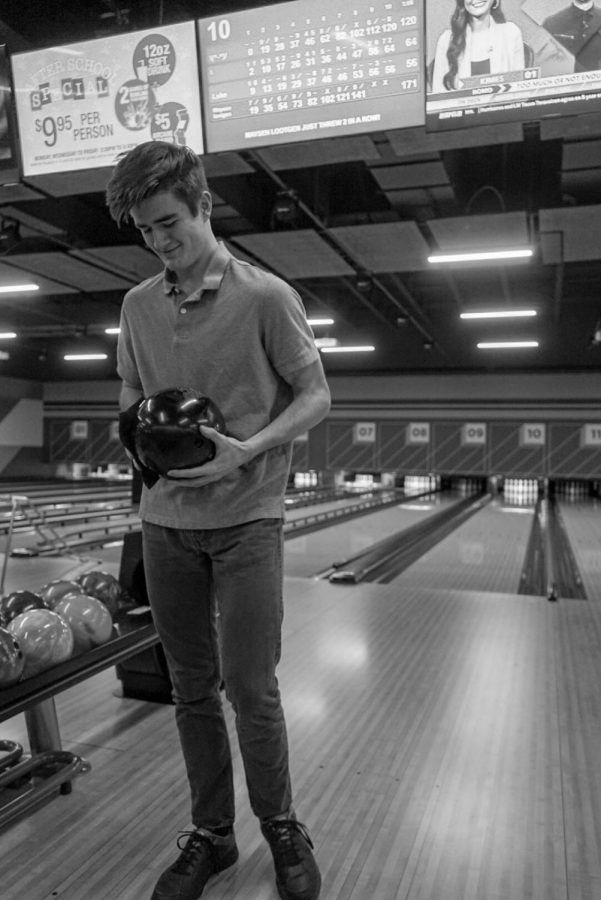 Wilsonville bowler from the bowling team takes on a foreign set of lanes to make is mark and make some quality rolls.