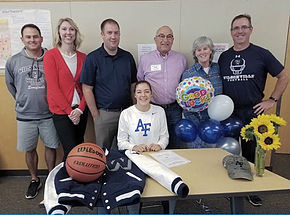 Sophie Bynum beams at her signing ceremony.