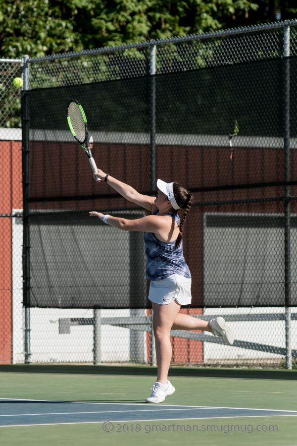 The girls tennis team taking on Mountain View in 2018.