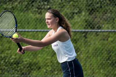 Pictured above is Mikayla Brehm during one of her varsity matches last season.