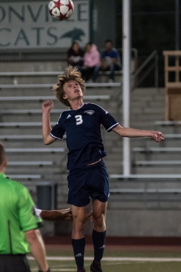 Ryan McCord goes up for a header 