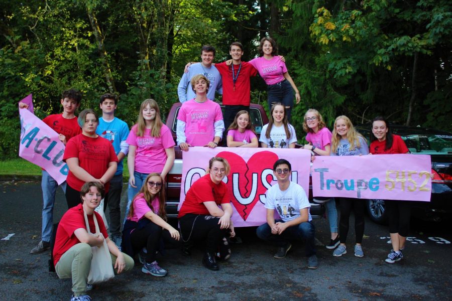 The wvhs theater department pose for a picture before they walk in the parade. Pictured above are some of the members of drama club.