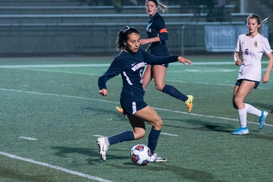 Senior Araxi Martinez dances around the defense. Martinez played a key role in the Wildcats winning league this year.