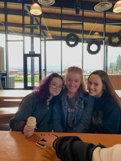 Seniors Kate Hedgepeth, Mikaela Ochocki, and Samantha Katz enjoy a few minutes of down time.  Wilsonville music students worked hard throughout the weekend.