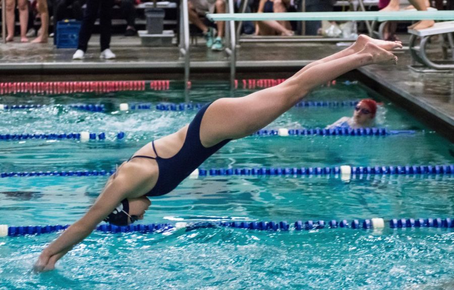 Abby Maoz swims the 50-yard breaststroke in the 200 medley relay. Maoz has broken many state records during her high school career.