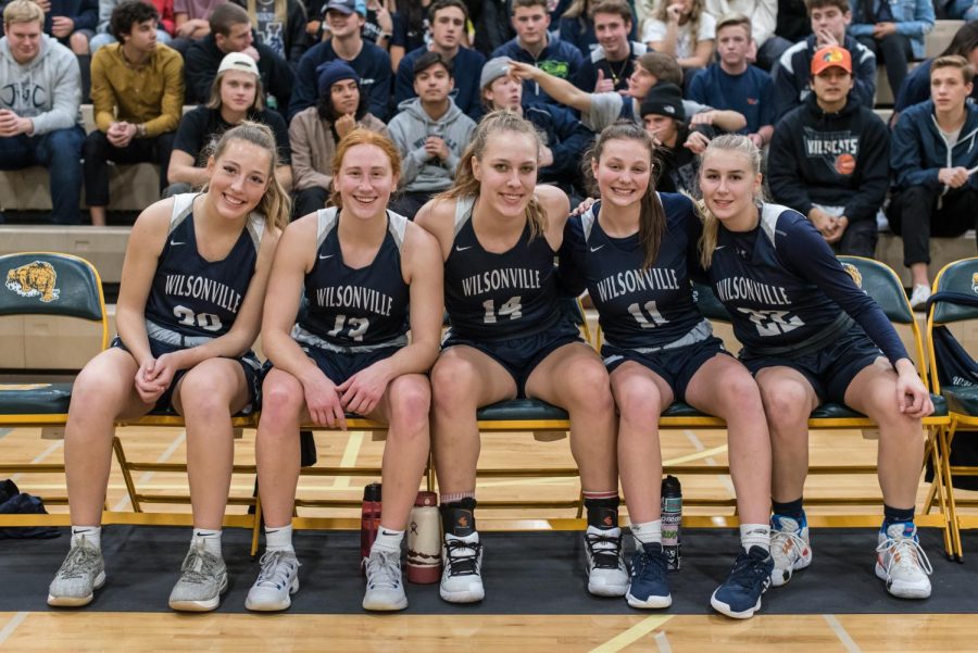 Wilsonville's starters pose before the tipoff. The Wildcat starting five played the majority of the fourth quarter and led the team to the victory over Churchill.