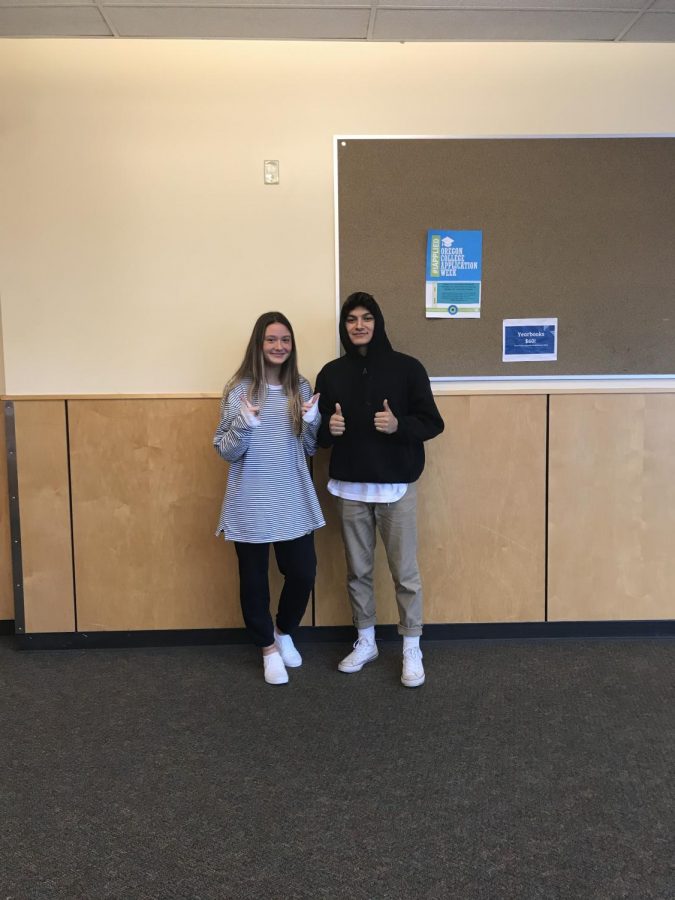 Timm and Carrillo stand against a WVHS wall after their joint interview.