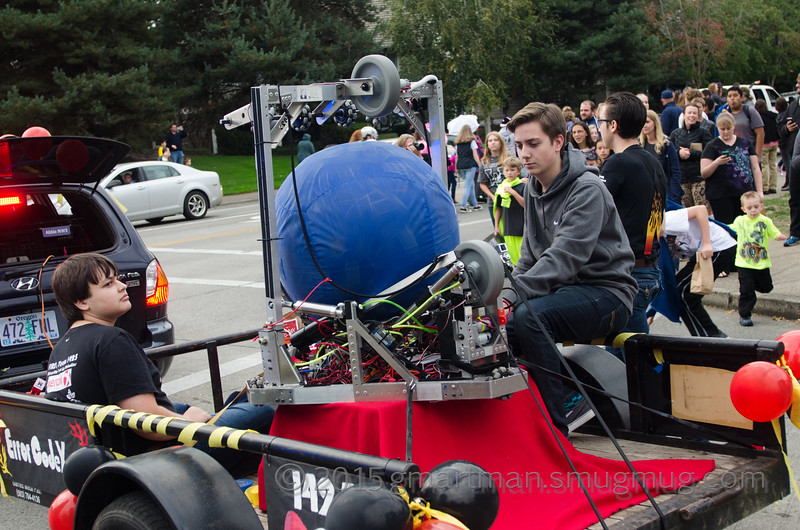 The Robotics team showing off their creation down Wilsonville Road.