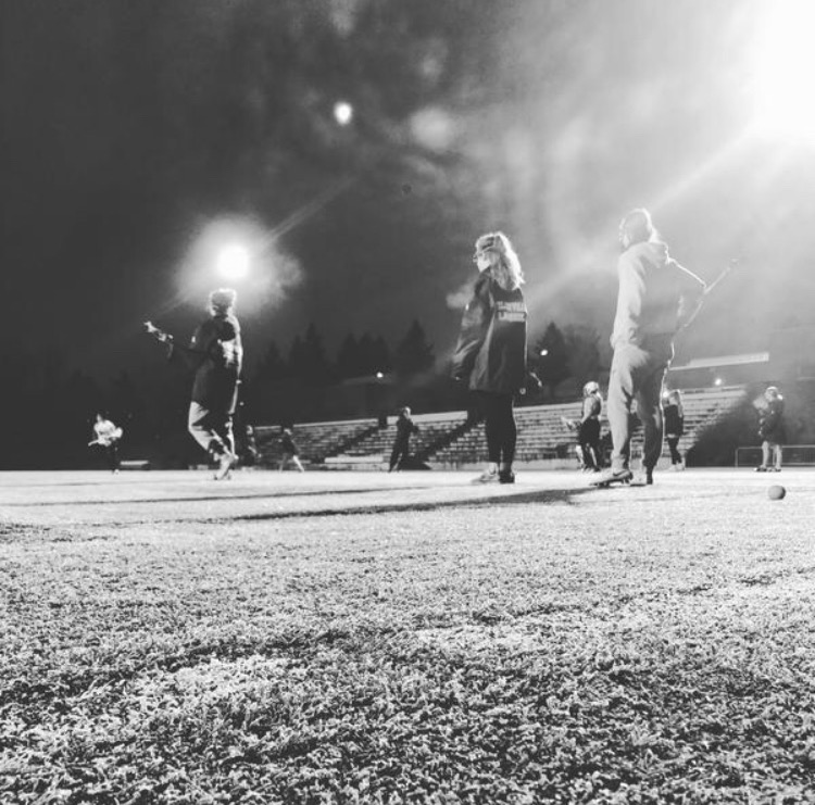 Girls’ lacrosse program practicing for their upcoming jamboree. Captains Kylie Hix, Brooklyne  Waddell and Sydney Carskadon lead the shuttle lines.