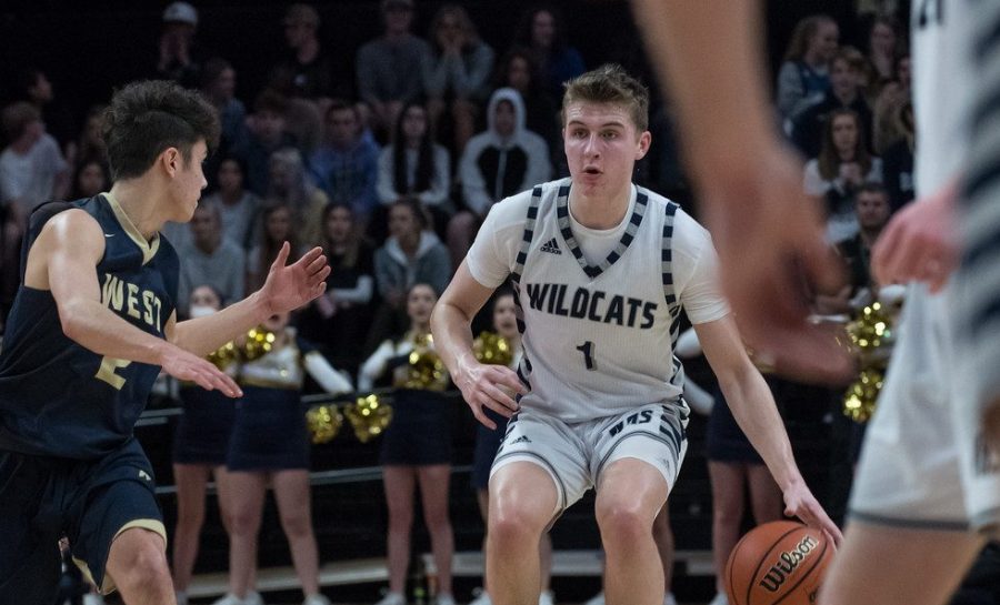 Gabe Reichle, a studly Wildcat Basketball alumni, plays great denfense. Sophomore Maxim Wu seems to have learned a thing or two from his former senior, by the way he was clamping down Molalla.