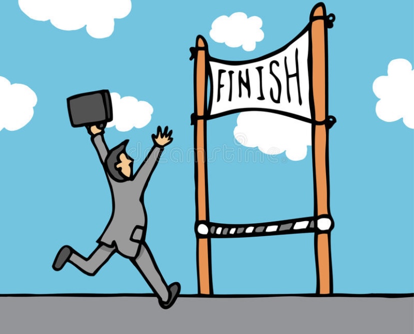 Man reaching the finish line. Photo belongs to @Dreamstime