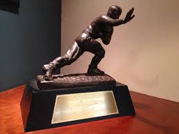 Pictured above is the Heisman Trophy of 1966, which was awarded to Steve Spurrier. As the most prestigious award given to college football players, it holds a certain amount of fame and awe in itself. 