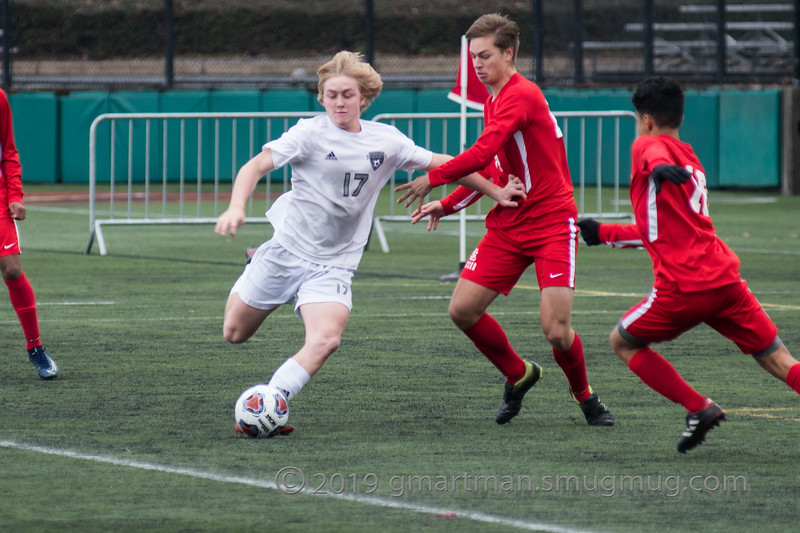 Adam Landy fights to take a shot in a 2019 game. Soccer has returned as of today, when WHS took down LSHS.