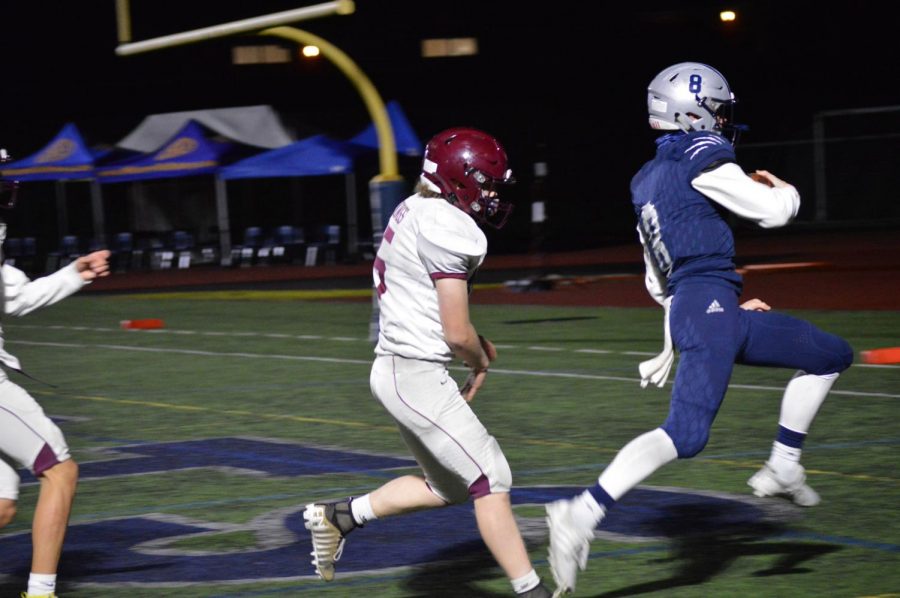 Quarterback Jayce Knapp prances into the endzone for his second todown of the night. The Wildcats win 59-22.