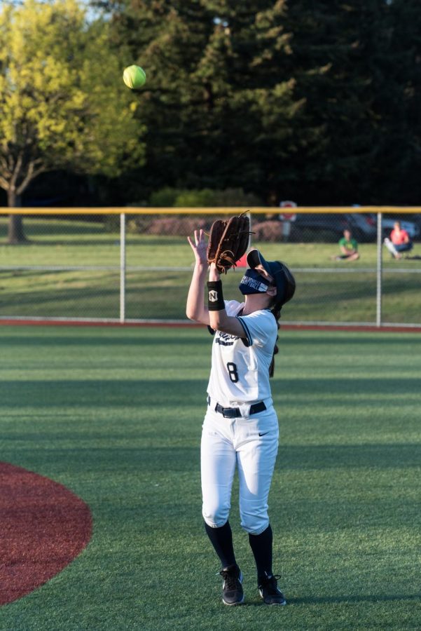 Junior Natalie Adams fielding a pop fly. The Wildcats continued their perfect season after defeating Hillsboro 10-1.