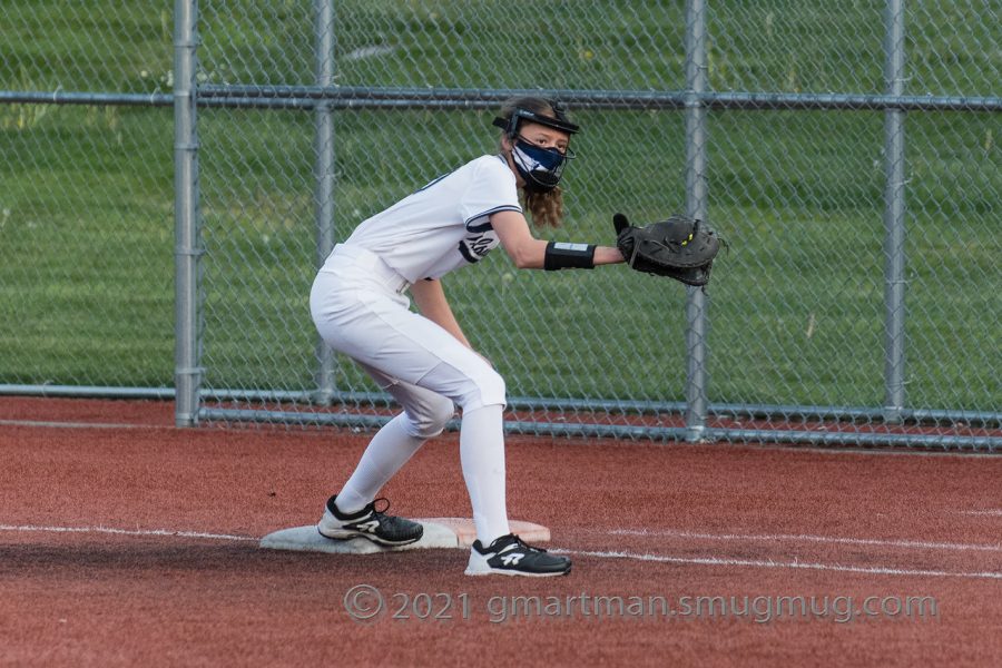 Freshman Talia Valdez catches the ball at first base. The Wildcat softball team boasts immense underclassmen talent this year.