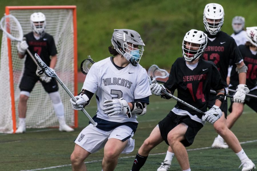 Eli Nelson drives to goal during one of the Cats' previous home games against Sherwood.