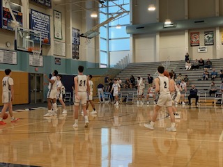 Boys Varsity Basketball team during halftime. 