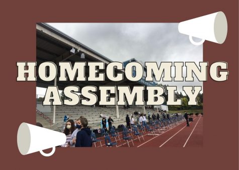 Staff setting up for the assembly. It was under the cover of the football stadium, with students sitting on the bleachers.