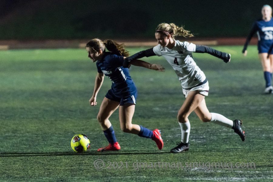 Kenley Whittaker makes her defender miss while attempting a shot. Both the Cats' offense and defense were strong all game.